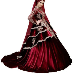 Burgundy sparkly prom dress with intricate embroidery and luxurious suede fabric, perfect for formal events.