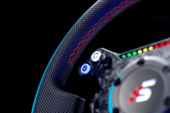 Leather Simagic Round 330mm steering wheel from Trak Racer UK with detailed grip and metal spokes for racing simulation setups.