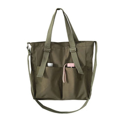Adistore women's shopper bag with zippered crossbody and tote shoulder design, solid color, versatile and spacious for daily use.