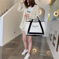 Adistore bohemian beach straw tote bag for women, stylish luxury designer handbag with woven straw design and sturdy handles.