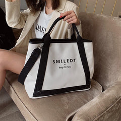 Adistore bohemian beach straw tote bag for women featuring a spacious design and stylish woven straw pattern.