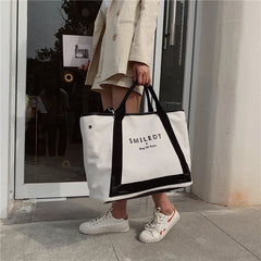 Bohemian beach straw tote bag for women by Adistore, featuring woven design and spacious interior for seaside essentials.