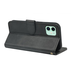 Black leather flip book case for iPhone 11 by Phone Base, featuring wallet-style design with card slots and secure closure.