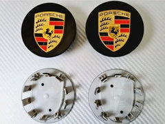 Eliteridegear Porsche wheel center caps in black and gold, featuring a sleek design for stylish vehicle enhancements.