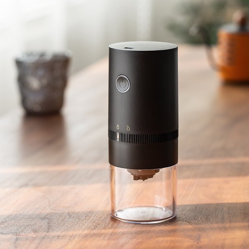 Adistore electric stainless steel coffee grinder with a compact design and stainless steel burrs for precise bean grinding.