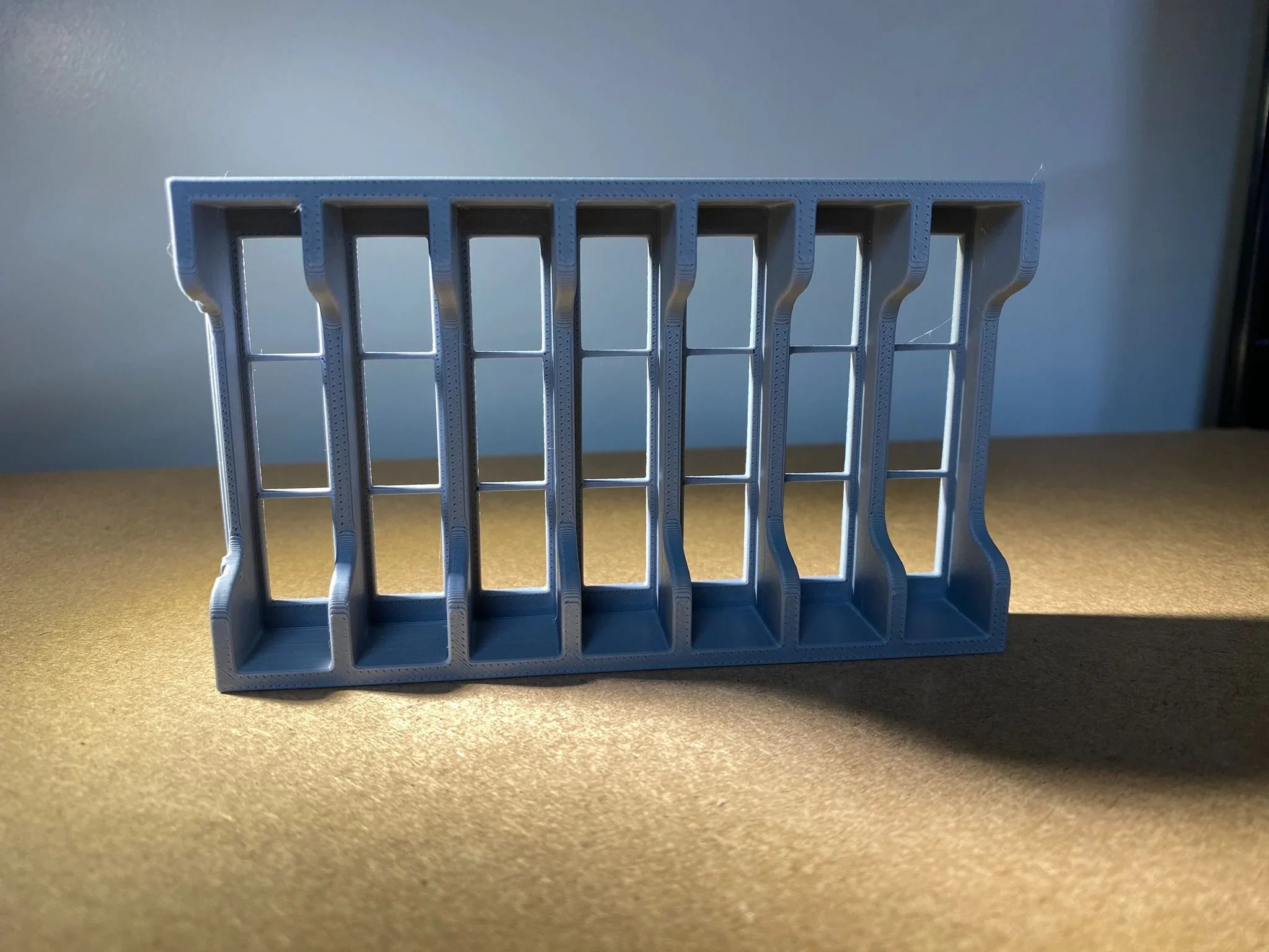 Game Display Game Boy game storage case with multiple slots for organizing classic handheld game cartridges.