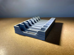 Game Display Game Boy game storage case with multiple slots for organizing classic handheld game cartridges.