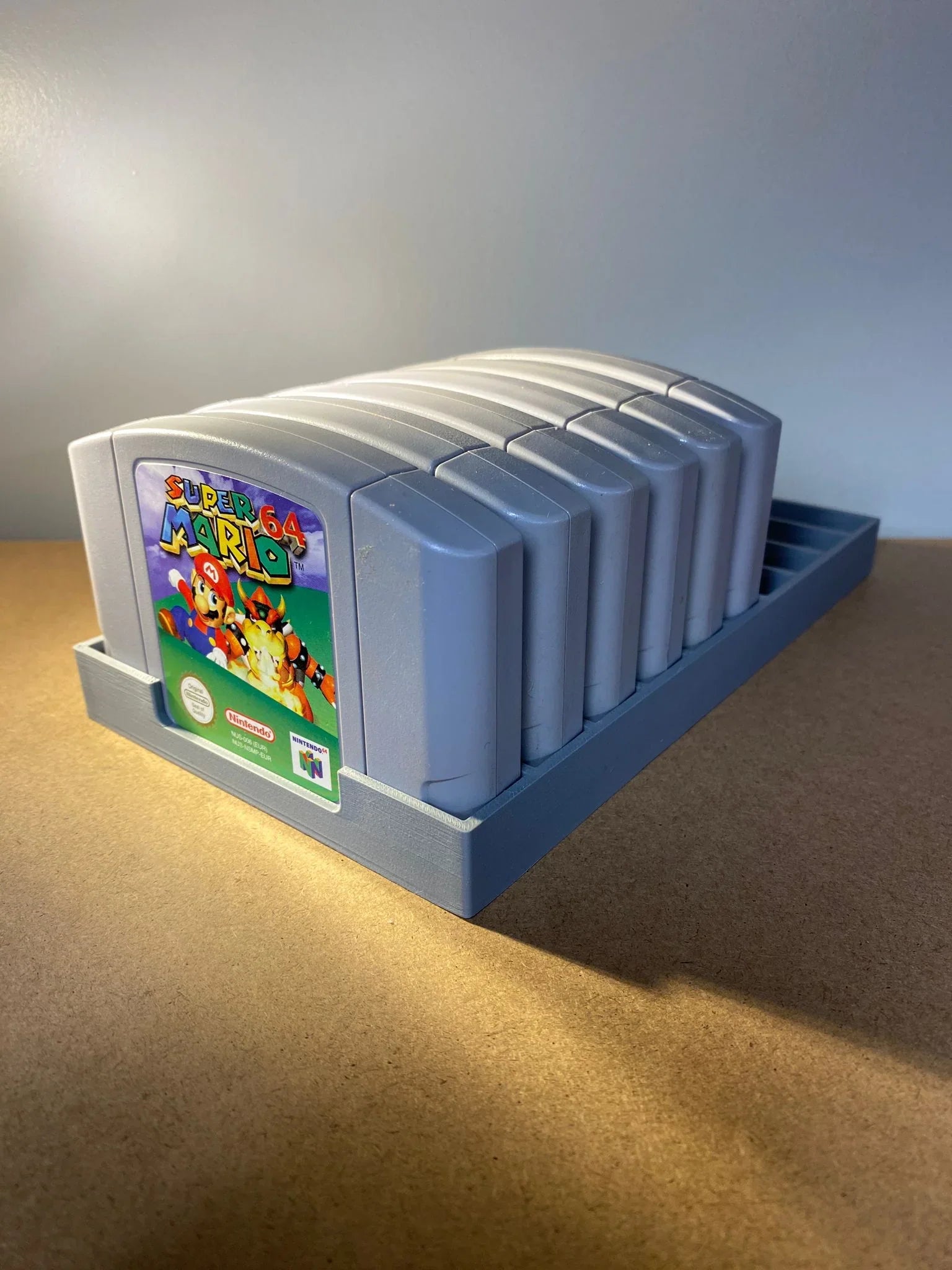 Game Display N64 Game Storage holder for 12 Nintendo 64 cartridges, organized display for classic game collection display.