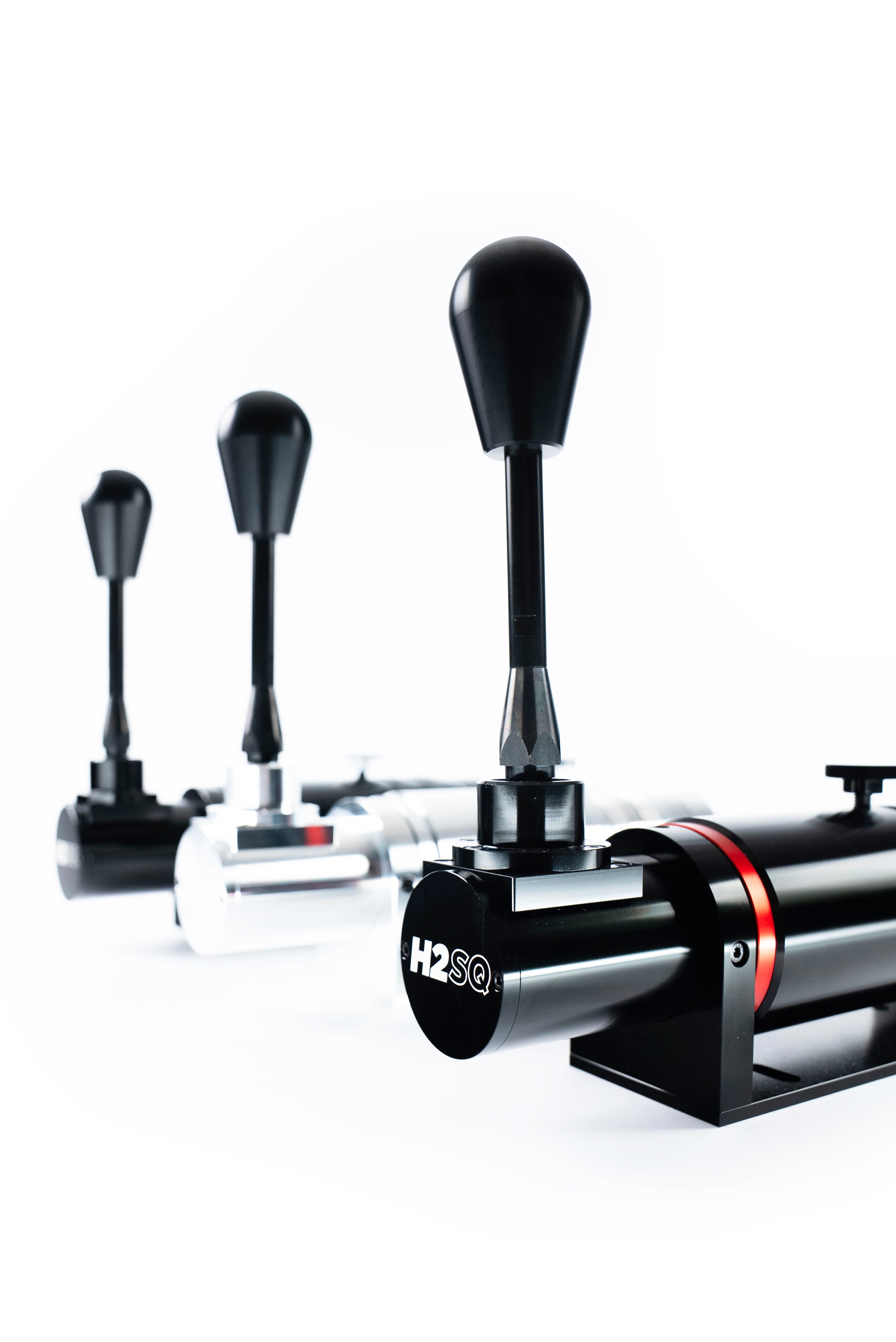 Trak Racer UK BDH H2SQ dual-mode shifter with metal handle and mounting base for racing simulation setups.
