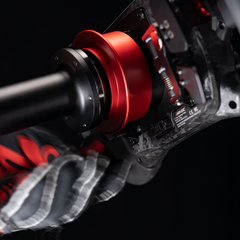Simagic MagLink magnetic quick-release adapter for wheels, compatible with 50 and 70 mm QR interfaces, by Trak Racer UK.