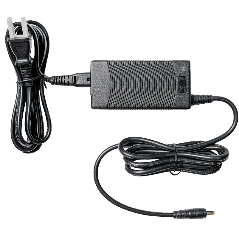 Simagic P-APS accessories power supply unit for haptic, LED, and heel-stop modules, compatible with Trak Racer UK sim racing setups.
