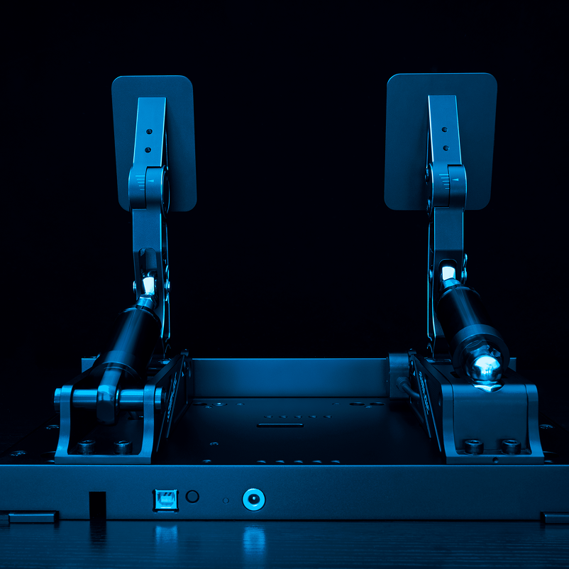Trak Racer UK Simagic P1000-2 modular racing pedals set with load cell and hall sensor, fully adjustable for racing simulation.