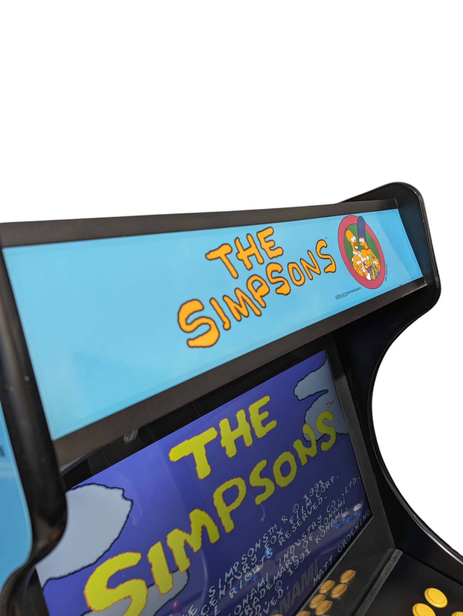 Deluxe 24 home arcade game with Simpsons theme by Roll Model Arcade, featuring colorful cartoon characters and gaming controls.
