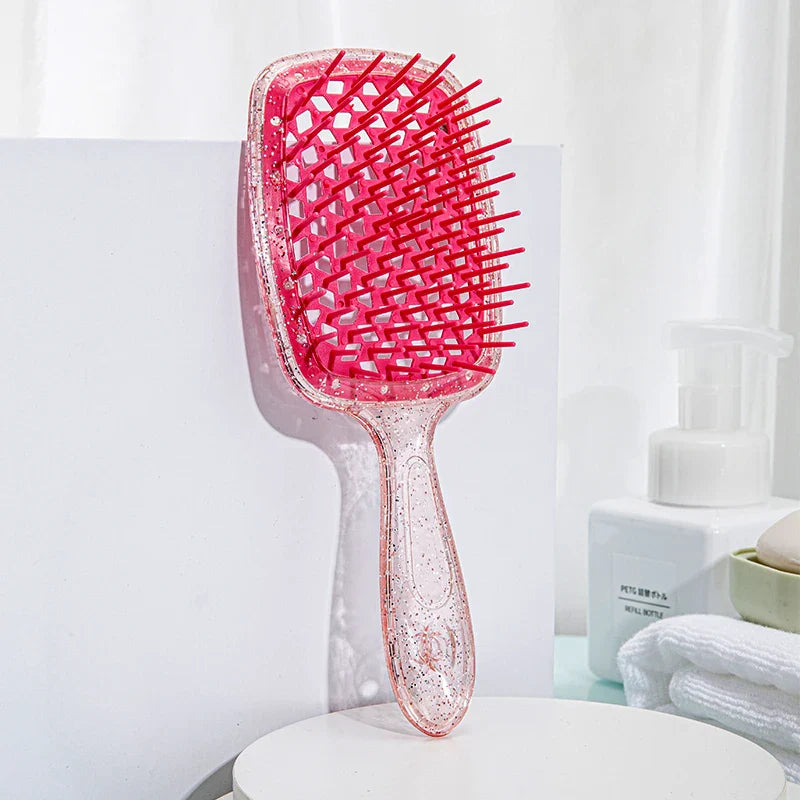 Adistore detangling hair brush with hollow comb design, ideal for wet and curly hair, featuring a massage-friendly handle.