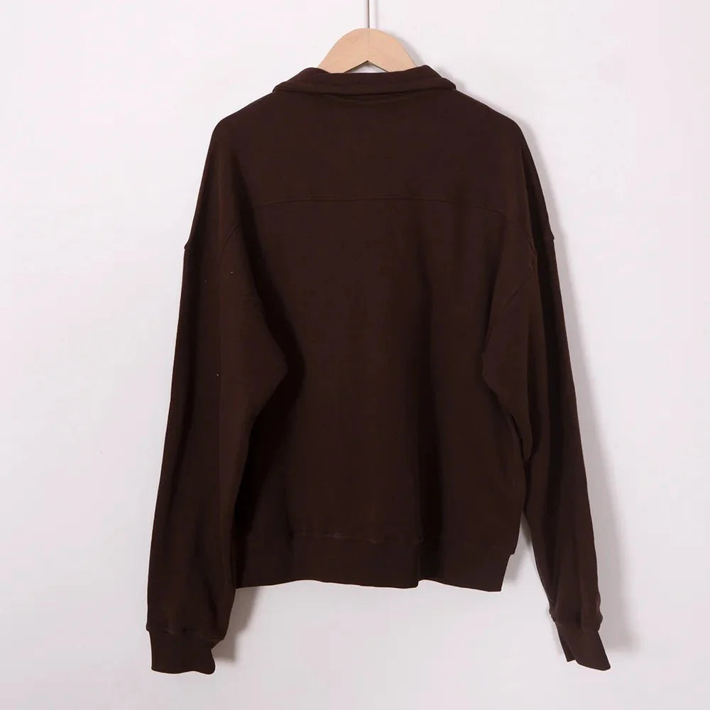 Adistore ZESSAM Club women's graphic sweatshirt with long sleeves and collar, featuring a stylish casual design.