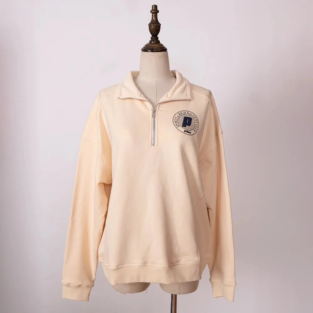 Women's ZESSAM Club graphic sweatshirt by Adistore featuring long sleeves and a collar, displayed on a neutral background.