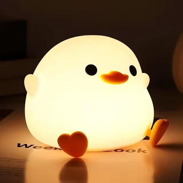 Cute bunny cartoon night light with touch dimming and USB recharge, ideal for children's bedside sleep and bedtime decor.