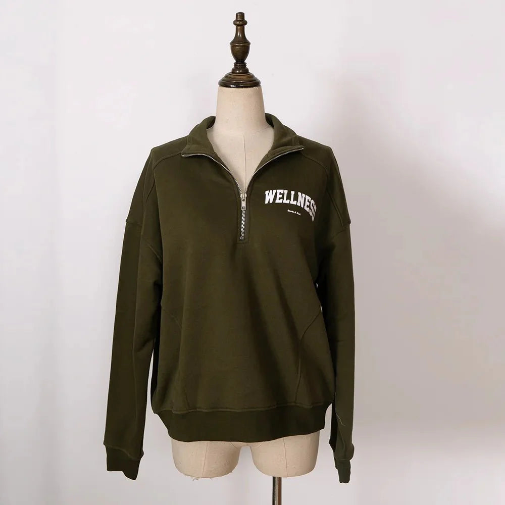 Women’s ZESSAM Club Graphic Sweatshirt by Adistore featuring long sleeves and a collar, with a stylish graphic design.