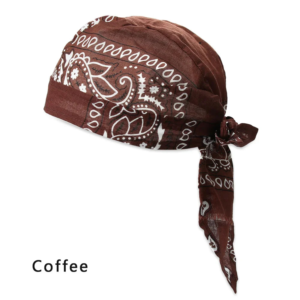Unisex satin long tail doo rag durag bandana cap with pirate and turban style, worn as hip hop or biker headwrap, black color.