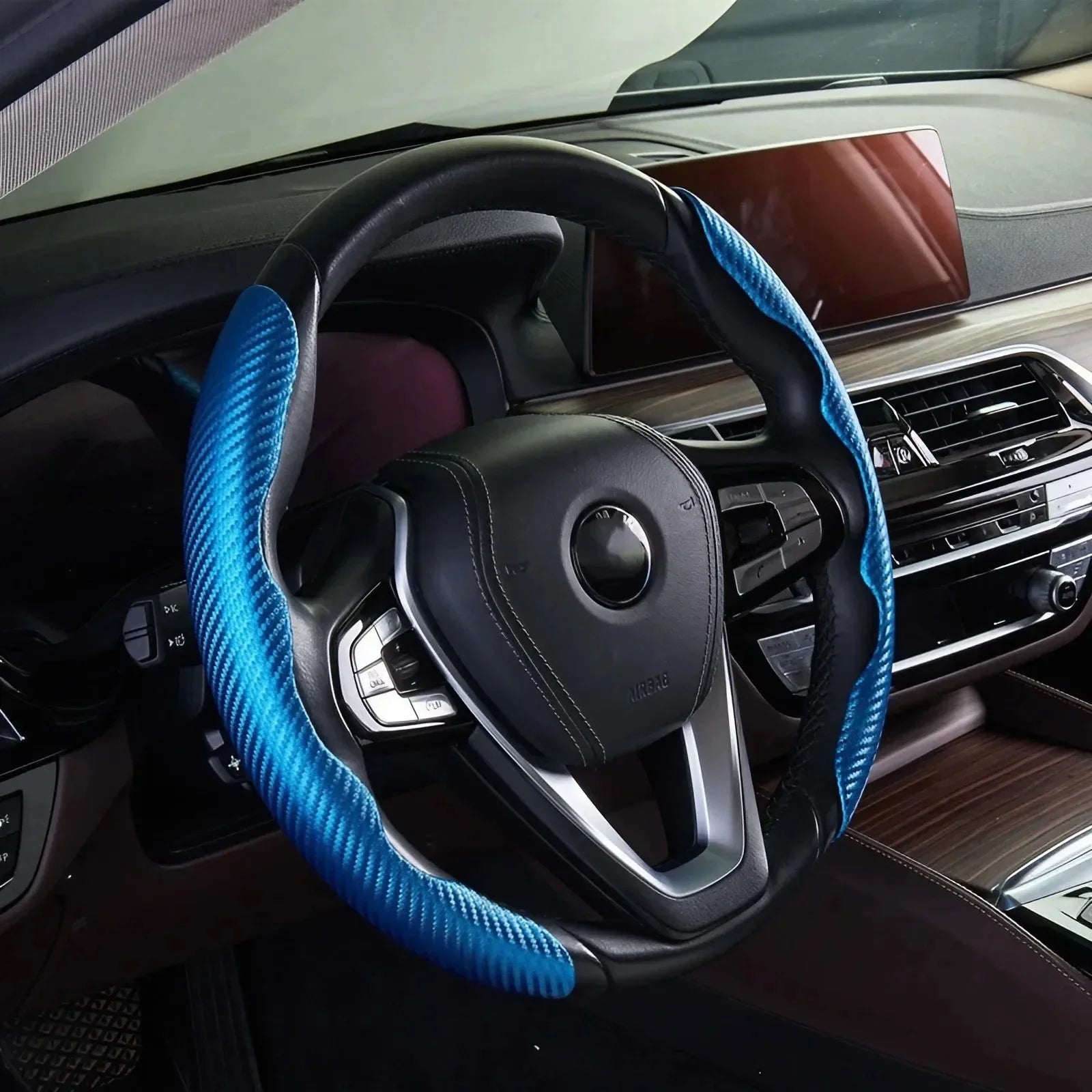 Eliteridegear universal steering wheel cover with ultra-thin carbon fiber design and anti-slip pattern on a car wheel