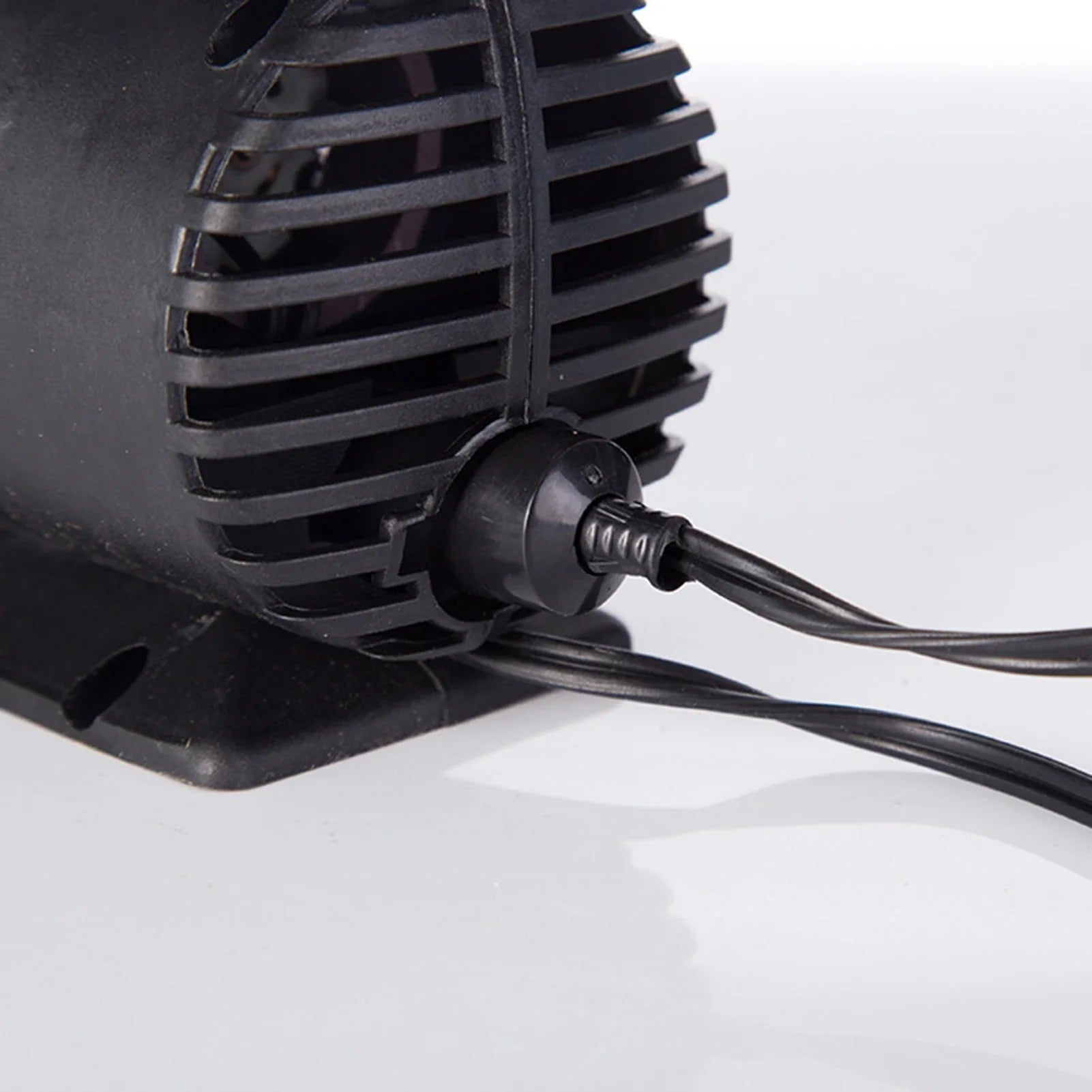 Eliteridegear small compact air pump inflator for vehicles and sports equipment, showing the device with hose and nozzle attachments.