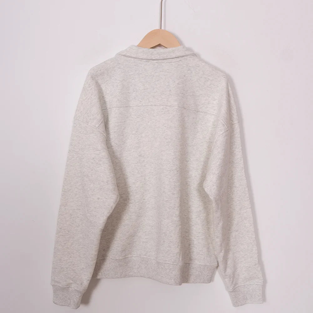 Adistore ZESSAM Club graphic sweatshirt for women, long sleeve with collar, featuring bold design and comfortable fit.