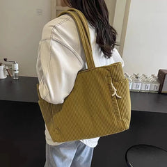 Large beige casual corduroy shoulder handbag with zipper and spacious tote design, by Adistore.