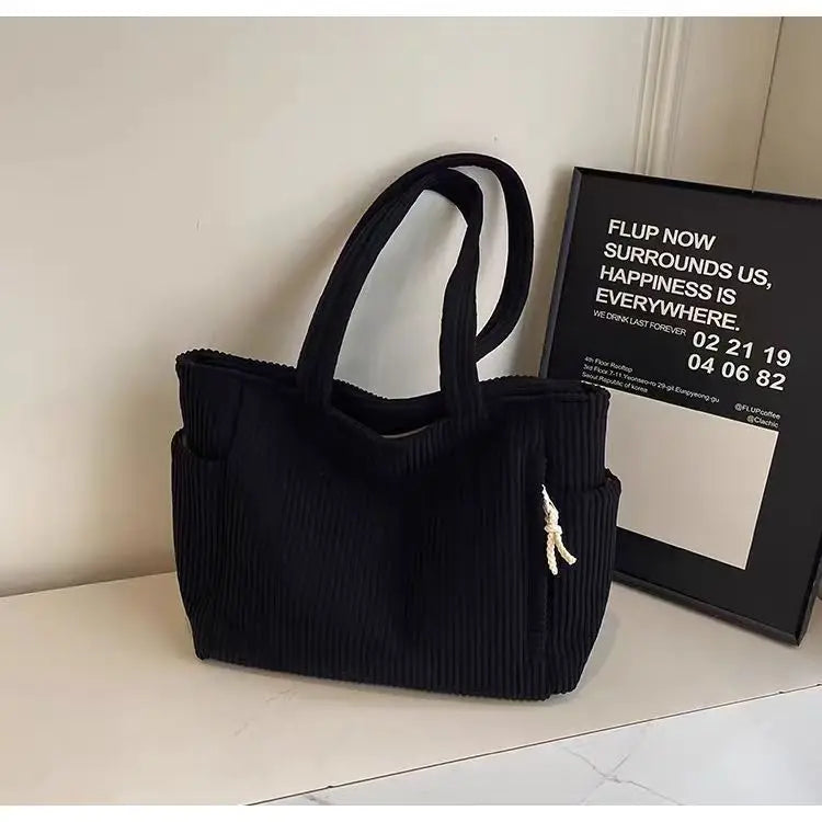 Large capacity casual corduroy shoulder handbag with zipper, stylish tote by Adistore, featuring a spacious interior and comfortable straps.