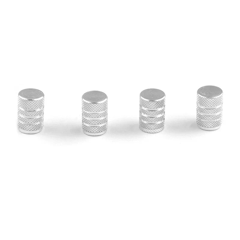 Set of 4 aluminum car tire valve stem caps with dust covers, universal fit, designed for vehicle wheel air valves.