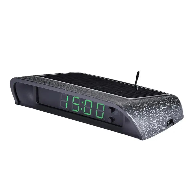 Eliteridegear portable solar car digital LCD clock and temperature display on a vehicle dashboard with backlight.