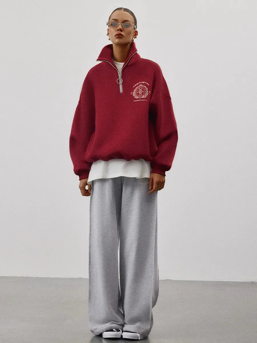 Adistore ZESSAM Club graphic sweatshirt for women, long sleeve with collar, casual stylish sweatshirt with graphic design.