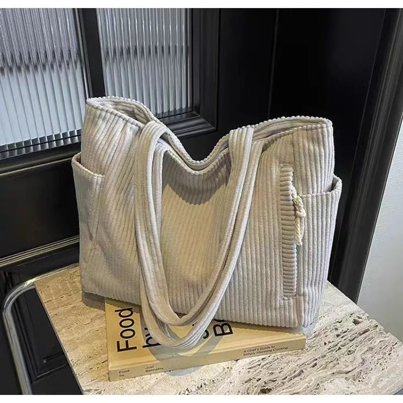 Adistore casual corduroy shoulder handbag with zipper, large capacity tote, featuring a spacious interior and stylish design.