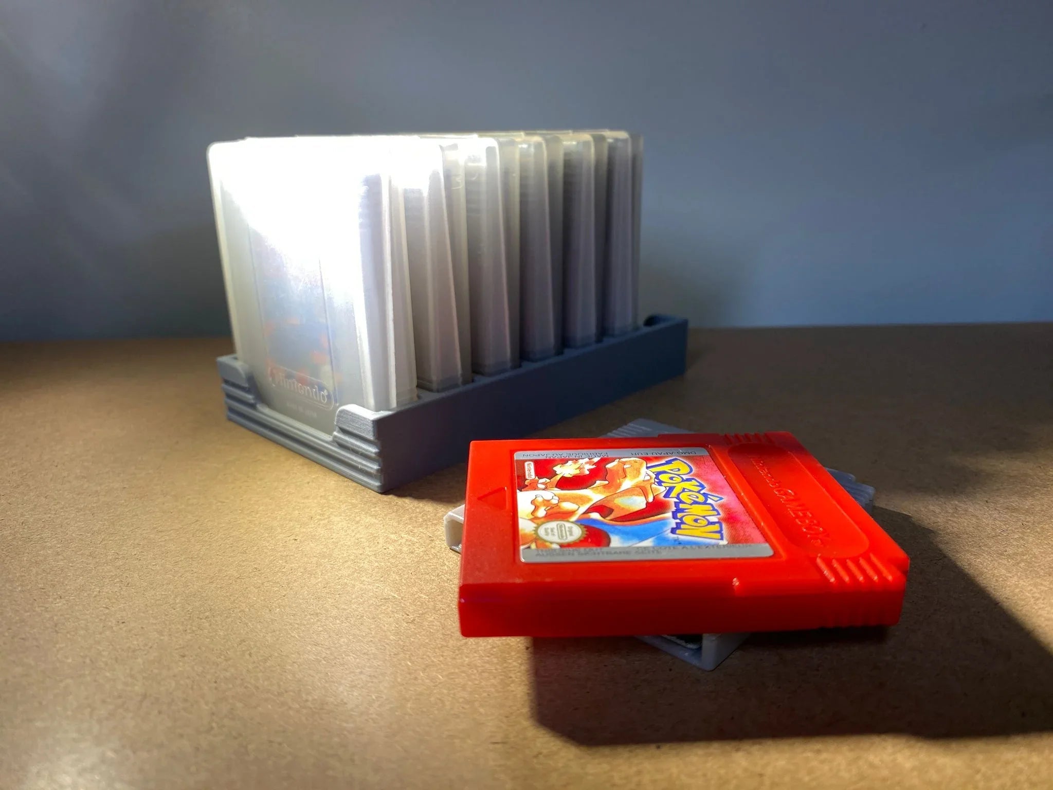 Game Display Game Boy game storage case holding multiple game cartridges, compact and organized for easy access.