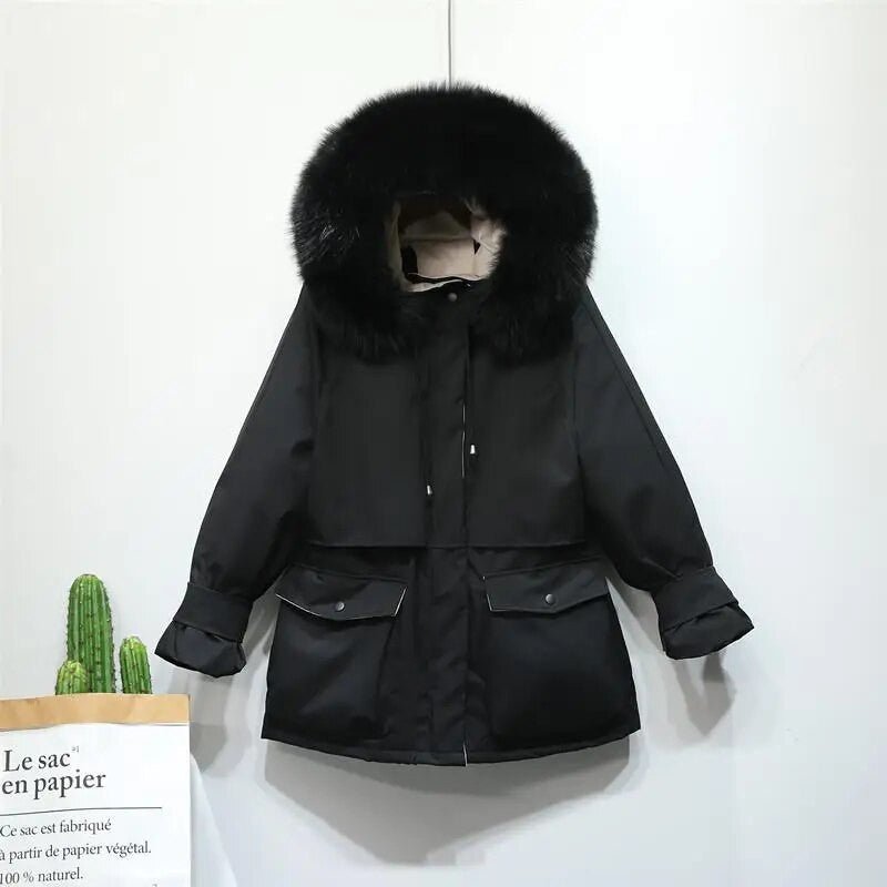 Women's winter jacket with large natural fox fur hood, stylish ladies jacket from Adistore, featuring warm, plush fur trim.