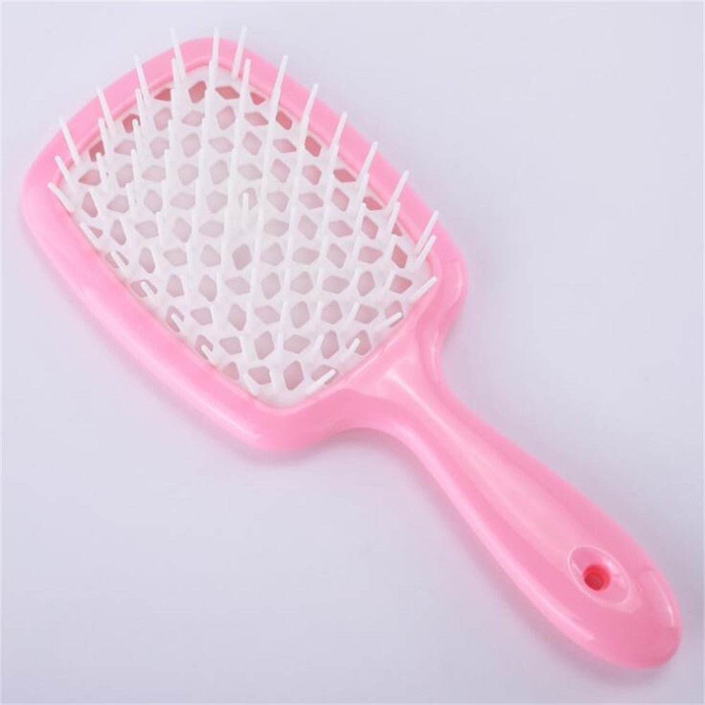 Adistore detangling hair brush with hollow comb design for wet and curly hair, showing flexible bristles and ergonomic handle.