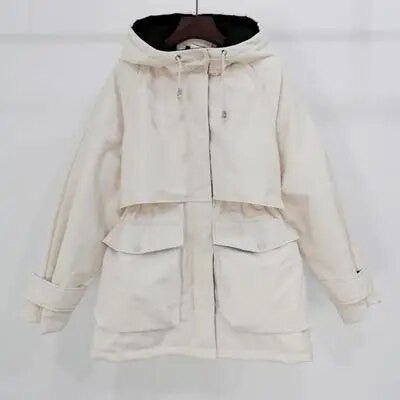 Women's winter jacket by Adistore with large natural fox fur hood, featuring a stylish and warm design for cold weather.