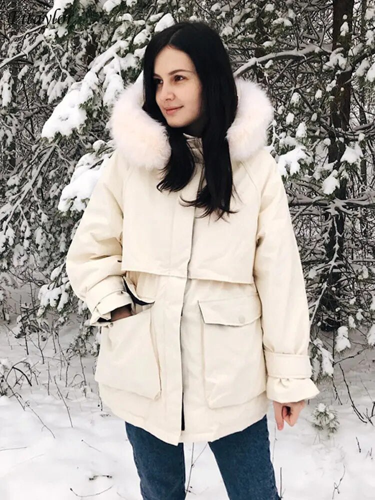 Women’s winter jacket with large natural fox fur hood, Adistore ladies coat in warm, stylish winter outerwear.