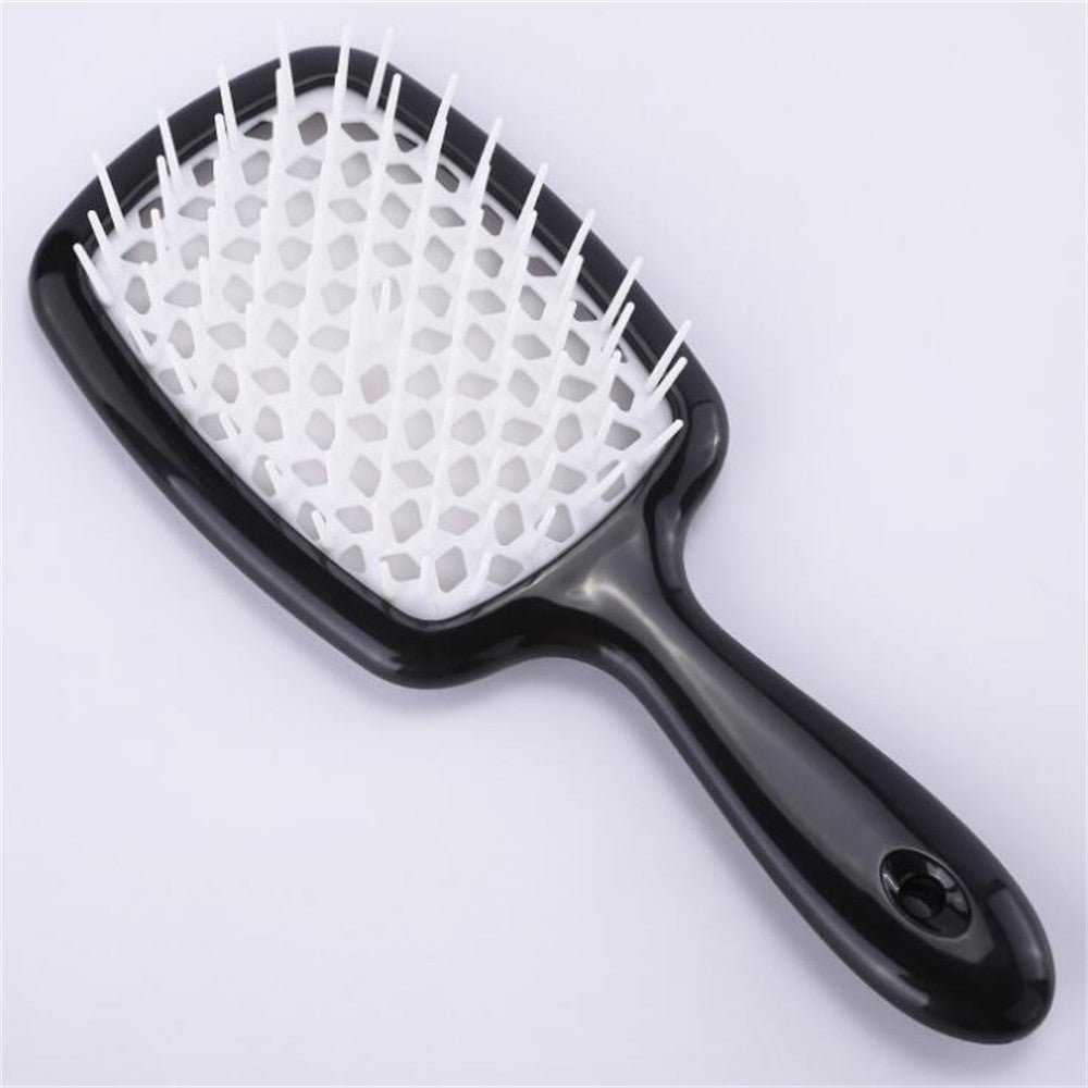 Adistore detangling hair brush for wet and curly hair with massage hollow comb design, showing flexible bristles and ergonomic handle.