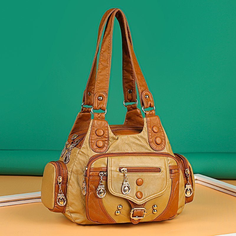 Genuine leather women's messenger bag by Adistore, designer crossbody handbag with adjustable strap and sleek leather finish.