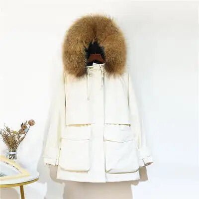 Women's winter jacket with large natural fox fur hood, stylish ladies jacket featuring a fur-lined hood and warm winter fabric.