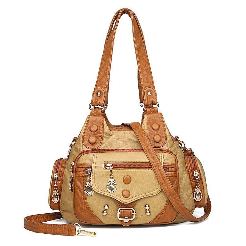 Genuine leather women's messenger bag by Adistore, stylish crossbody handbag with adjustable strap and classic design.