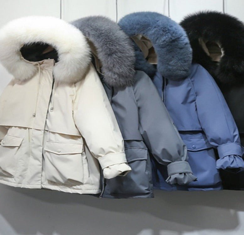 Women's winter jacket with large natural fox fur hood, stylish Adistore ladies jacket perfect for cold weather.