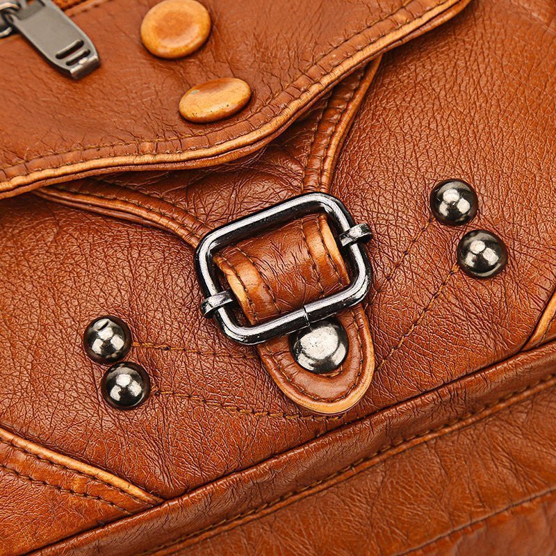 Genuine leather women's messenger bag by Adistore, stylish designer crossbody handbag with adjustable strap and sleek design.