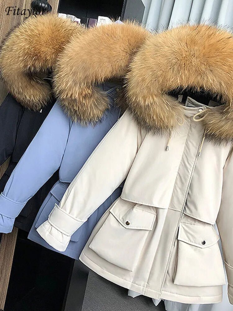 Women's winter jacket with large natural fox fur hood, stylish ladies jacket by Adistore, featuring a warm, plush fur trim.