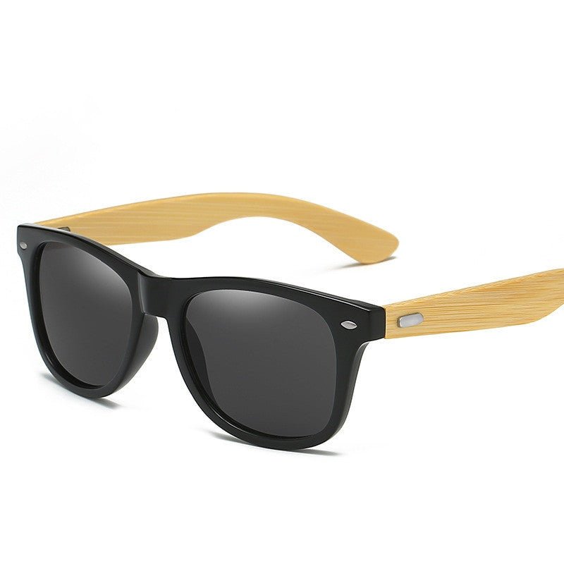 Adistore SUDOLE wood bamboo polarized UV400 vintage unisex driving sunglasses with tinted lenses and stylish frame.