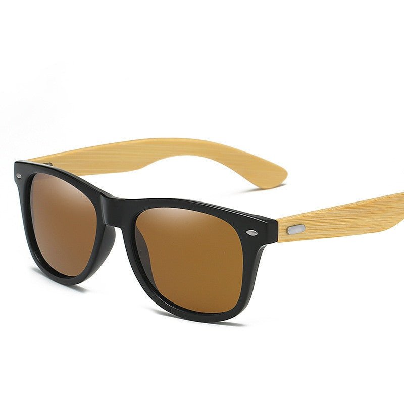 Adistore SUDOLE wood bamboo polarised UV400 vintage unisex driving sunglasses with tinted lenses and wooden frame.