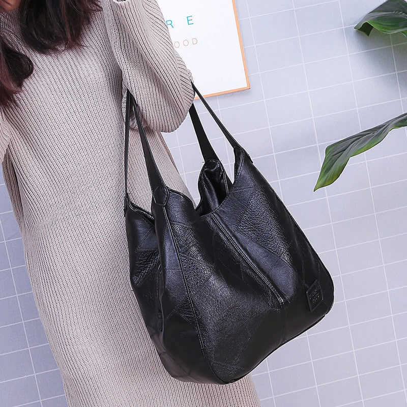 Adistore vintage PU leather Boston small handbag with crossbody strap, compact travel purse in classic style.