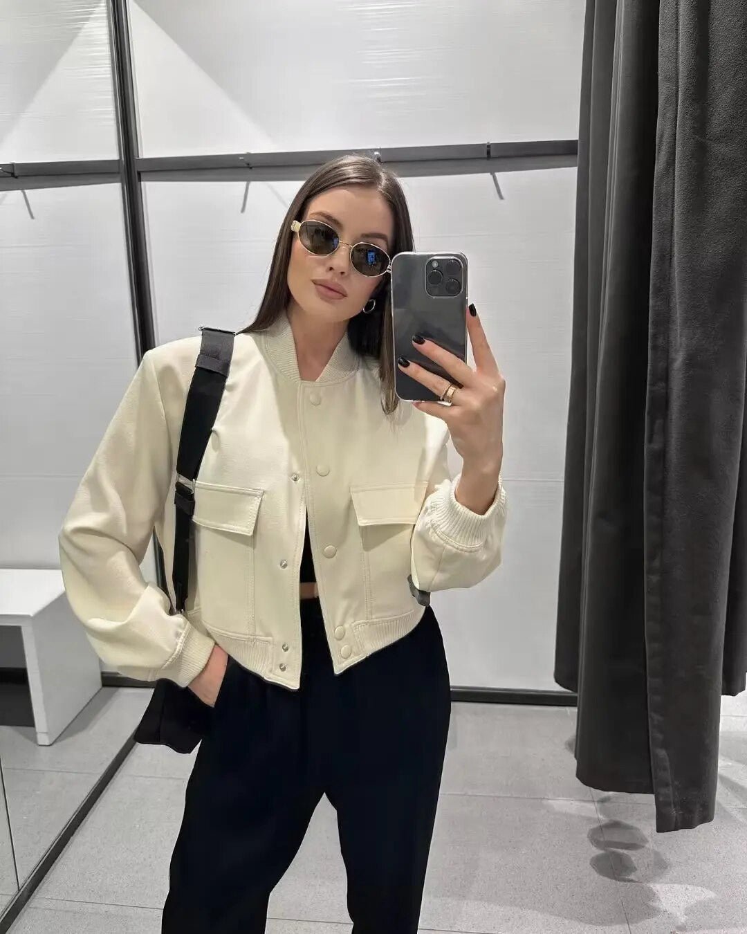 Adistore SLTNX TRAF women's bomber jacket with long sleeves and pockets, stylish ladies' jacket in black fabric.