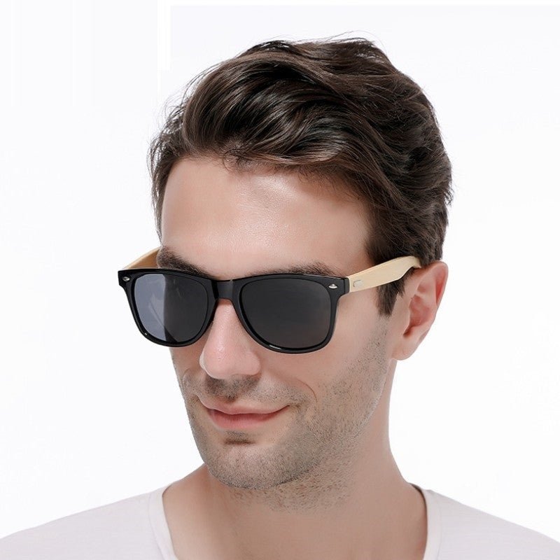 Adistore SUDOLE bamboo wood polarized UV400 vintage unisex driving sunglasses with dark tinted lenses and wooden frame.