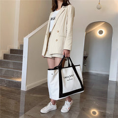 Adistore bohemian beach straw tote bag for women, featuring a stylish woven design and spacious interior for beach essentials.